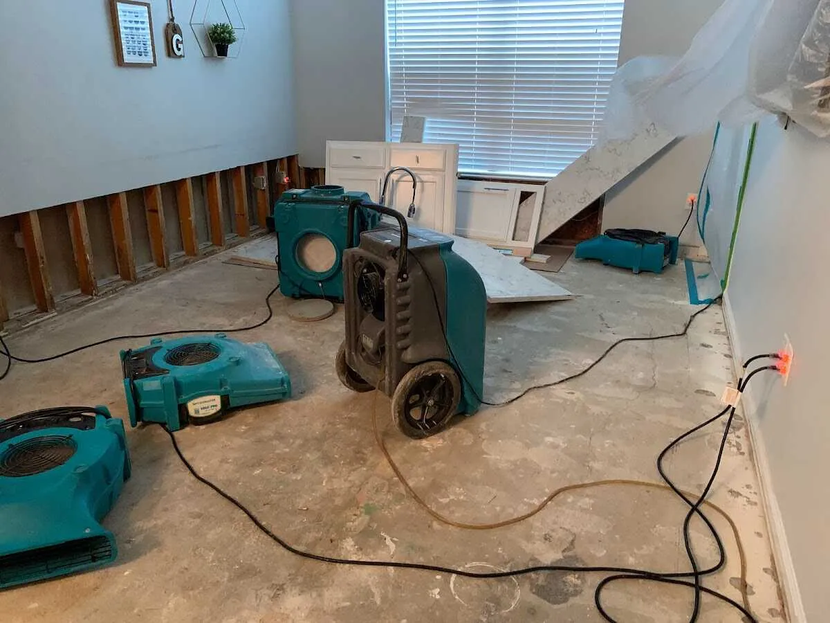 Dehumidifier in flood-cut room for Water Damage Restoration in Maple Heights